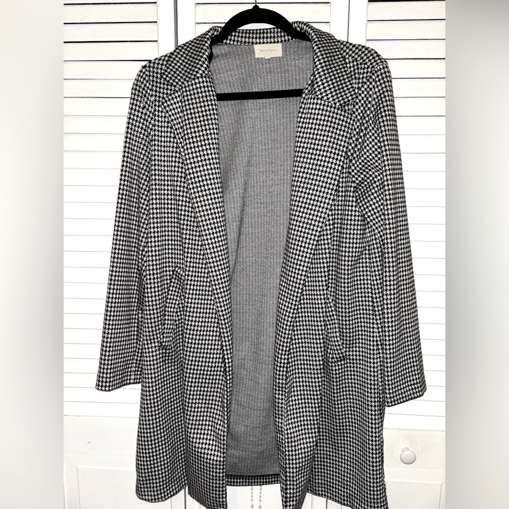 Black & white checkered overcoat, great for business casual looks!